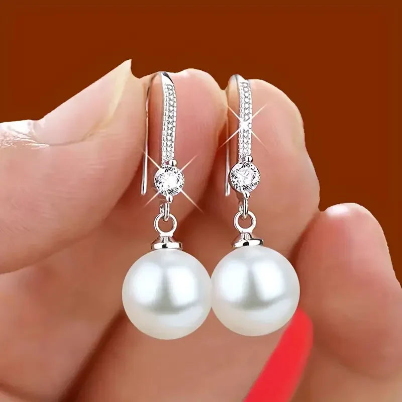 Boucles d'oreilles en perles de zirconium lustré | Or blanc
